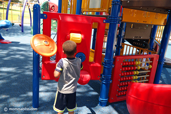 kid playing at playground