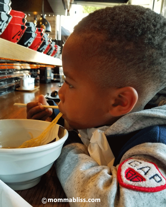 boy eating noodles